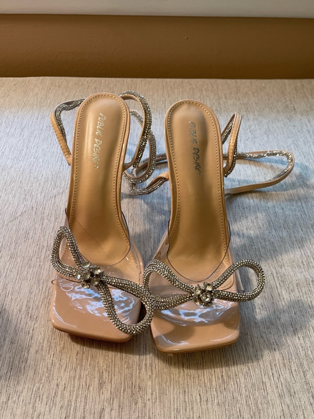 Nude Patent Strappy Heels with Crystal Bow Accents